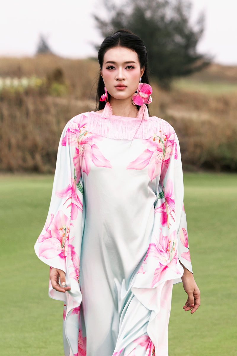 Colorful Valenciani Oasis Maxi Kaftan with vibrant multicolor pattern, flowing fabric, and relaxed fit, perfect for summer wear.