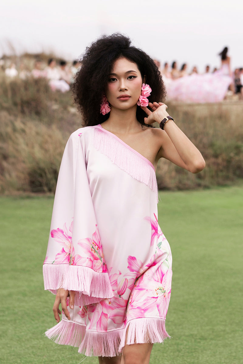 Pink Valenciani one-shoulder mini dress featuring a fitted silhouette and stylish design, perfect for casual or semi-formal occasions.