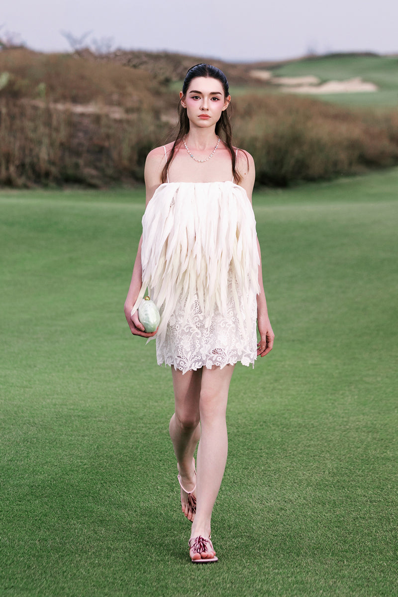 White Jelly Fish mini dress by Valenciani, featuring a stylish, fitted silhouette and elegant design perfect for summer occasions.