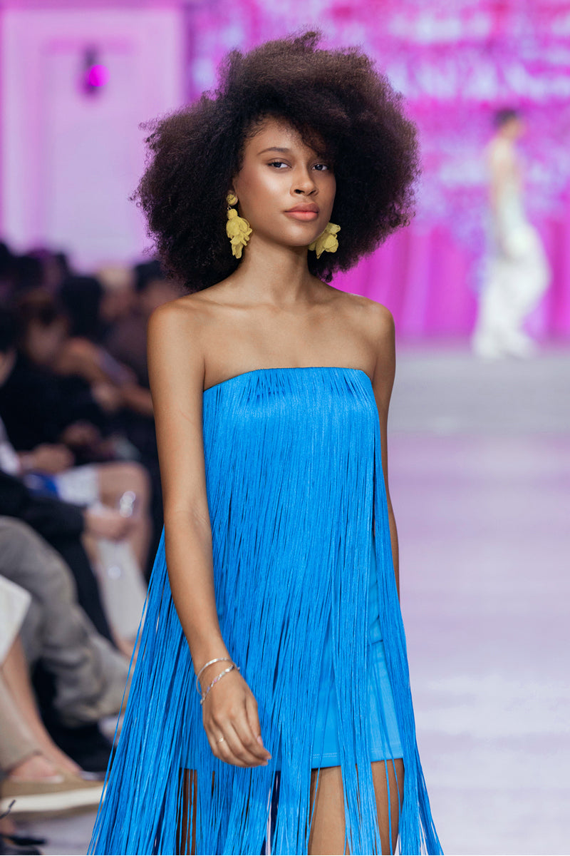 Valenciani CULT MIA X Valenciani all-over fringe midi dress with flowing fabric and detailed fringe design.