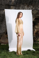 Aquarel Studio PYLA Pants in neutral fabric, featuring a relaxed fit and stylish design, displayed on a plain background.