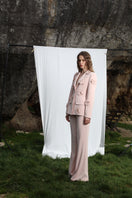A pair of Aquarel Studio GILA trousers with a relaxed fit and stylish design, displayed on a plain background.