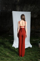 Aquarel Studio ARI TOP, stylish women's top with intricate design, shown in a natural pose on a neutral background.