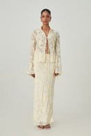 Light yellow maxi skirt from Summer Away's Evora collection, featuring a flowing design and elegant style.