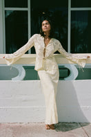 Light yellow EVORA maxi skirt by Summer Away, flowing fabric with a relaxed fit, perfect for casual or summer wear.