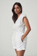 White DEIA Shorts by Summer Away, casual women's shorts with a comfortable fit, shown on a model.