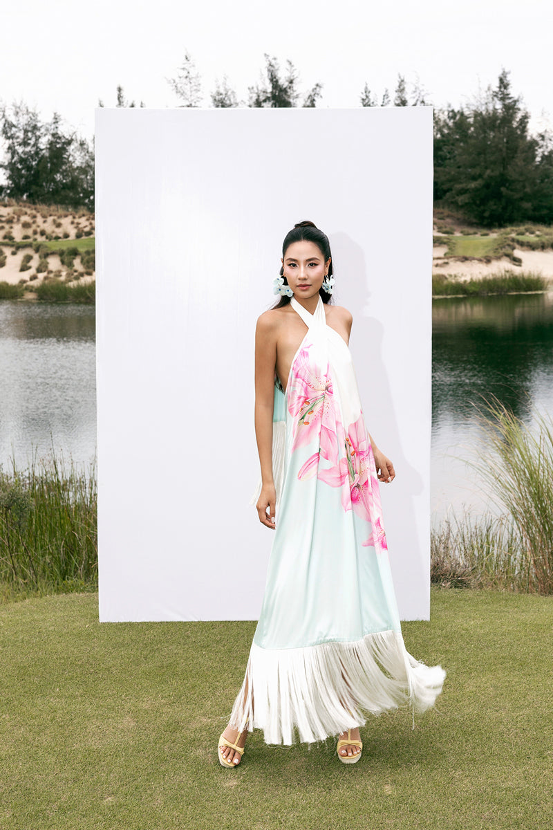 Valenciani Riviera halter maxi dress in vibrant multicolor, flowing fabric with a stylish halter neckline and elegant design.