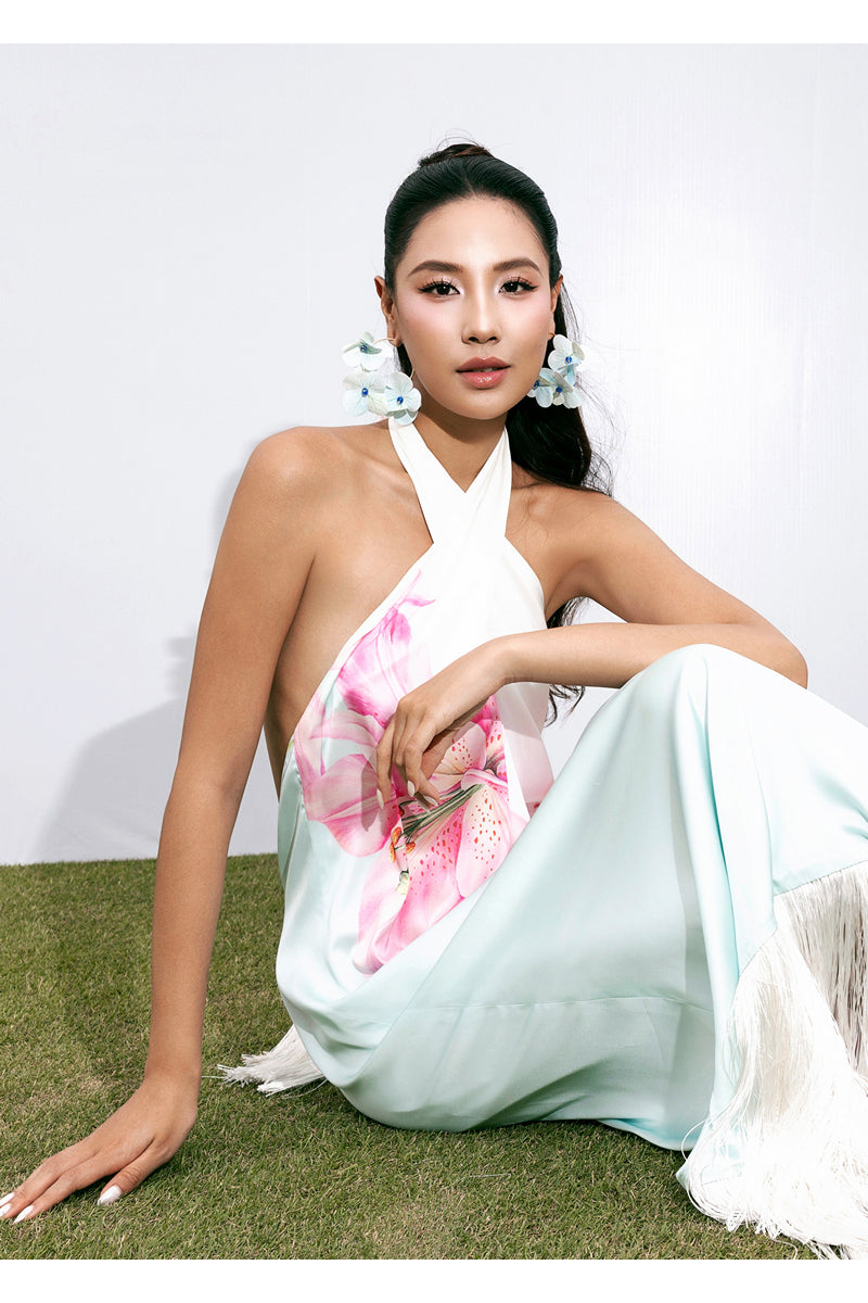 Valenciani Riviera halter maxi dress in vibrant multicolor with flowing fabric and stylish halter neckline.