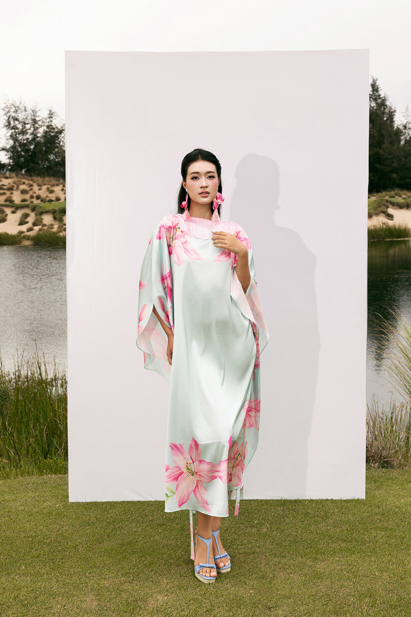Colorful Valenciani Oasis Maxi Kaftan with vibrant multicolor pattern, flowing fabric, and relaxed fit for a bohemian look.