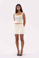 Cream mini skirt by La Granni featuring a stylish, fitted design perfect for casual or dressy outfits.