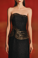 Elegant strapless straight gown by Lune De Soie with a fitted bodice and flowing skirt, perfect for formal occasions.