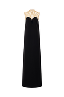 Lune De Soie sleeveless high neck gown featuring a sleek, elegant design with smooth fabric and a fitted silhouette.