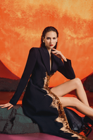 Lune De Soie long sleeve peak lapel trench coat displayed on a hanger, showcasing classic style and tailored design.