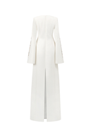 Long sleeve slit round neck gown by Tracy Studio, elegant dress with a flowing silhouette and stylish design.