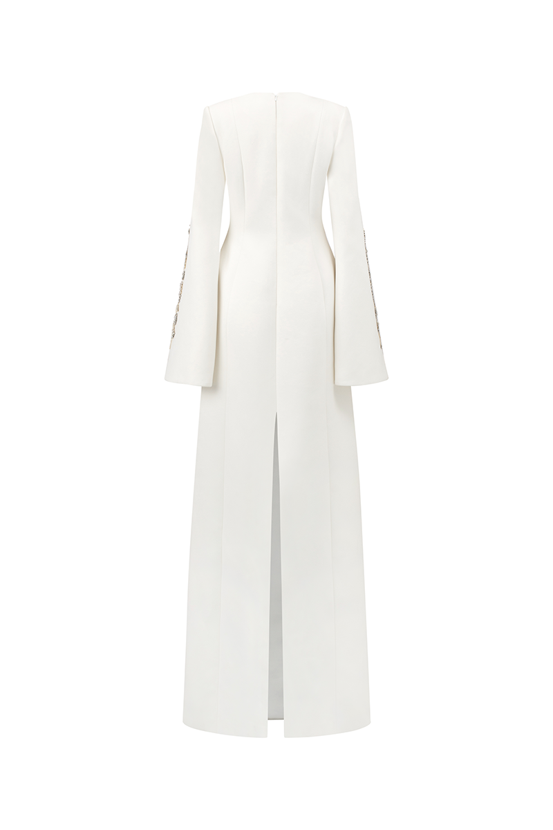 Long sleeve slit round neck gown by Tracy Studio, elegant dress with a flowing silhouette and stylish design.