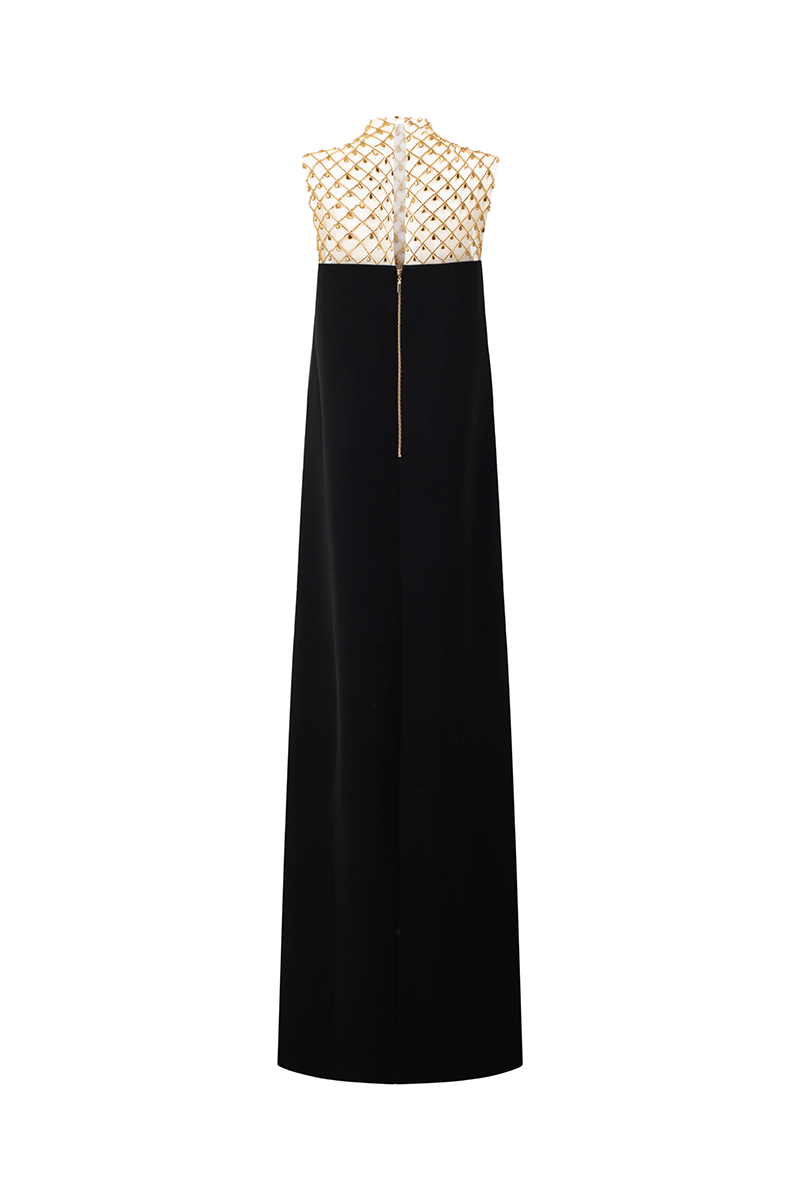Lune De Soie sleeveless high neck gown with elegant design, displayed on a mannequin in a neutral setting.