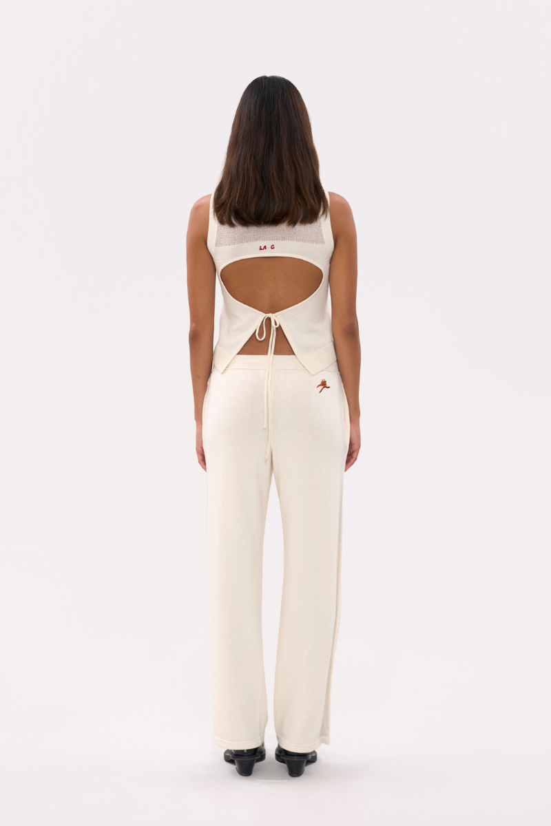 Cream-colored La Granni LA G top, stylish and comfortable, featuring a fitted design and soft fabric for everyday wear.