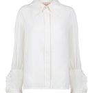 White Señorita Antonia blouse, stylish shirts with a relaxed fit, featuring a soft fabric and classic collar, displayed on a hanger.
