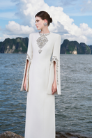 Tracy Studio long sleeve slit round neck gown, elegant black dress with a flowing silhouette and subtle slit detail.