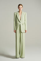 Mint single-breasted blazer by I.H.F Studio with asymmetric design and crystal-embellished pockets, stylish and elegant.