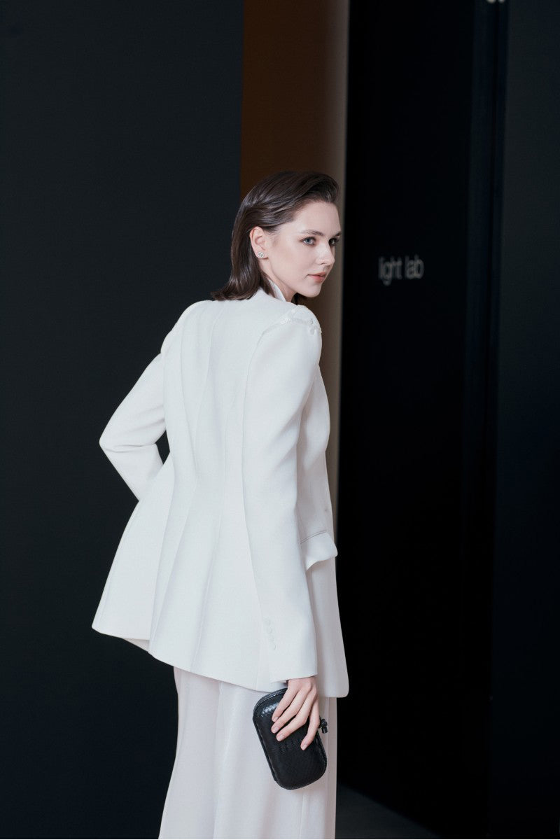 White LEKIEU Venice jacket, stylish lightweight outerwear with a modern fit, shown on a model against a neutral background.