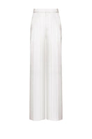 White LEKIEU CAEN pants with a relaxed fit, shown laid flat on a neutral surface.
