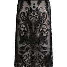Black midi skirt from Scarlett Gasque's Bianca collection, shown in a stylish, flowing design perfect for casual or formal wear.