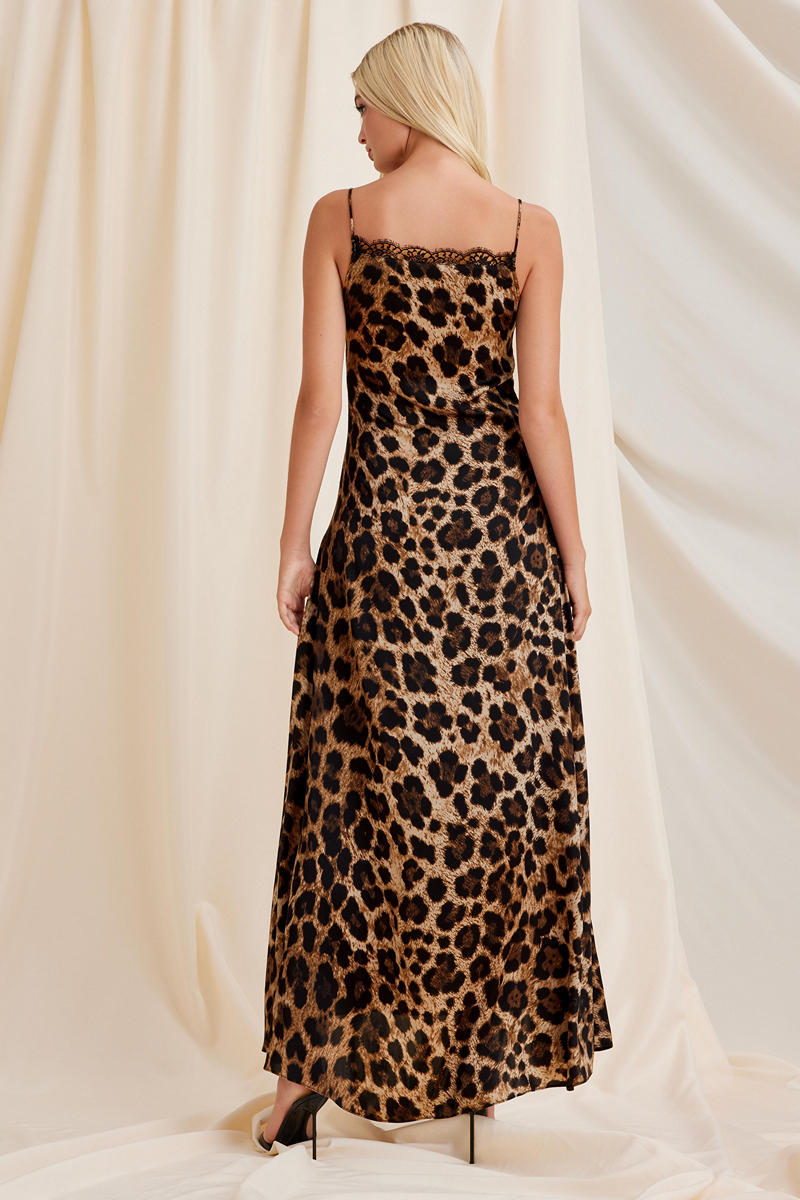 Scarlett Gasque leopard print maxi dress named Colette, shown from the back with flowing fabric and stylish design.