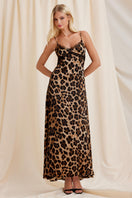 Scarlett Gasque leopard print maxi dress featuring a flowing silhouette and stylish design, perfect for elegant occasions.