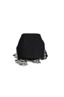 Black Scarlett Gasque Elora mini skirt displayed on a hanger, showcasing stylish, fitted design perfect for casual or dressy outfits.
