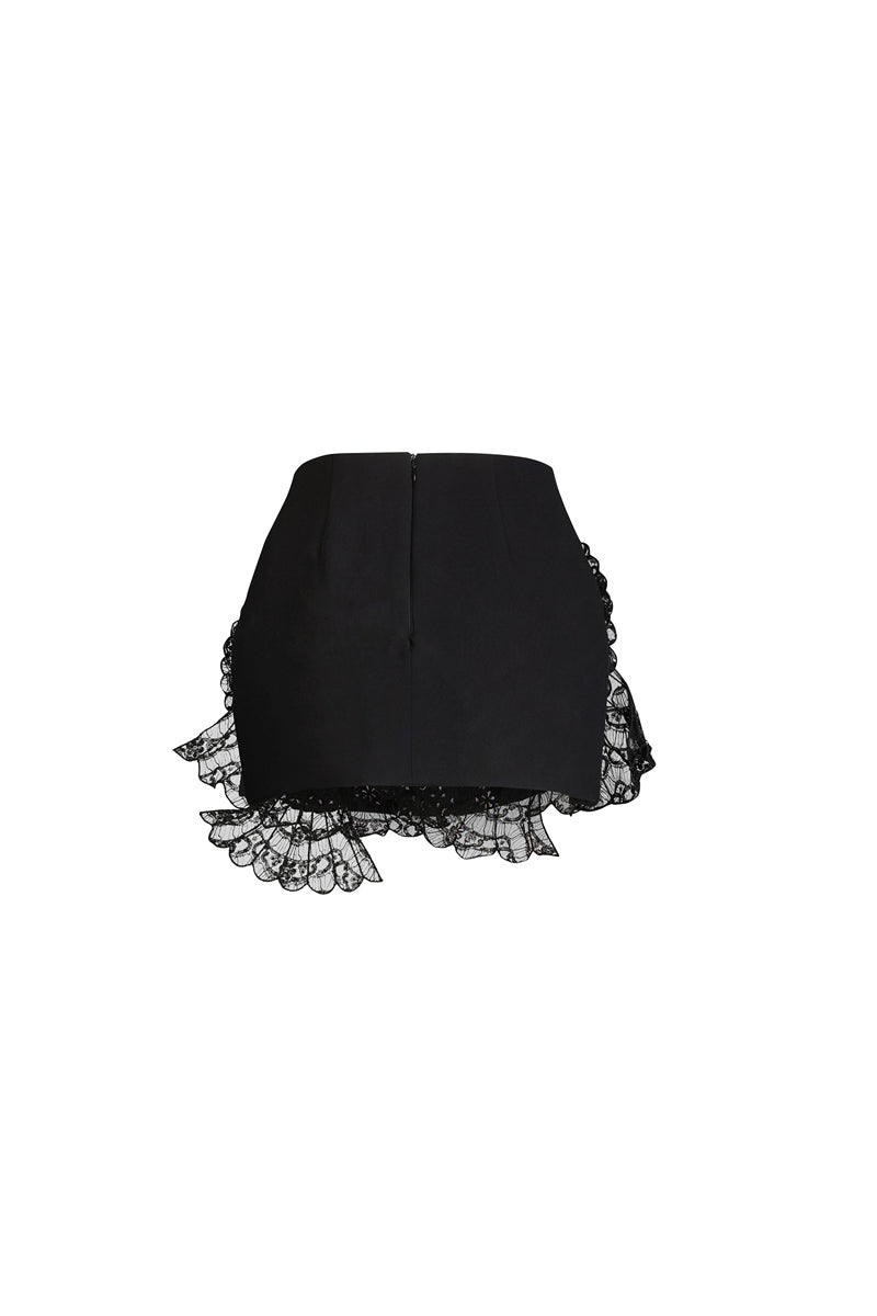 Black Scarlett Gasque Elora mini skirt displayed on a hanger, showcasing stylish, fitted design perfect for casual or dressy outfits.