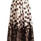 Scarlett Gasque Fiorella Dot Midi Skirt in chocolate mauve with a flowy silhouette and dotted pattern.