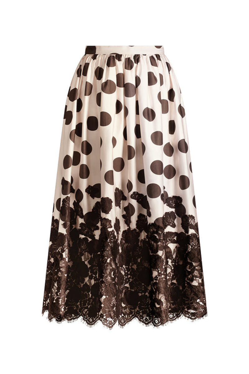 Scarlett Gasque Fiorella Dot Midi Skirt in chocolate mauve with a flowy silhouette and dotted pattern.