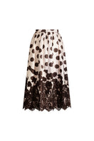 Scarlett Gasque Fiorella Dot Midi Skirt in chocolate mauve with a flowy, patterned fabric and a stylish, feminine silhouette.