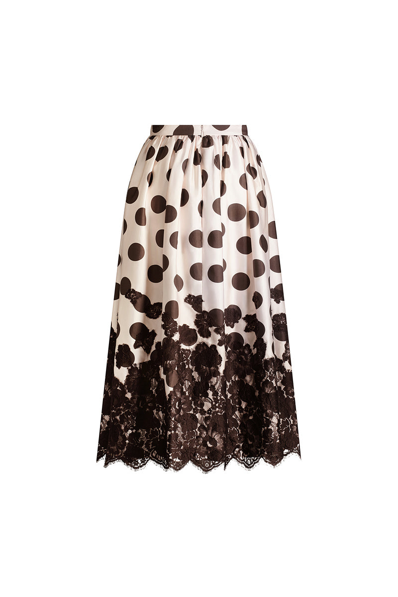 Scarlett Gasque Fiorella Dot Midi Skirt in chocolate mauve with a flowy, patterned fabric and a stylish, feminine silhouette.