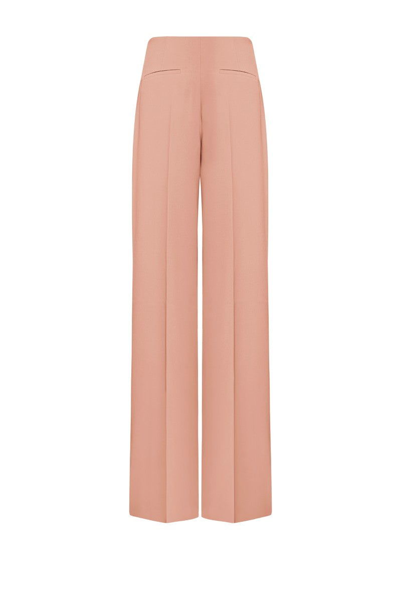 LEKIEU Saint-Paul orange pants with a relaxed fit, featuring a comfortable waistband and stylish design, shown on a model.