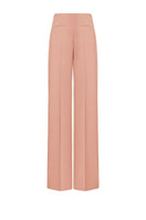 LEKIEU Saint-Paul orange pants featuring a stylish fit and vibrant color, shown on a model in a casual setting.