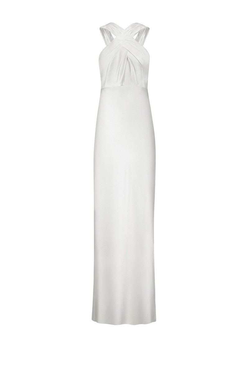 White Catania maxi dress by Lekieu hanging on a clothing rack, showcasing its flowing fabric and elegant design.