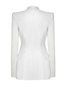 LeKieu Venice white jacket displayed on a hanger, showcasing its stylish design and fabric details.