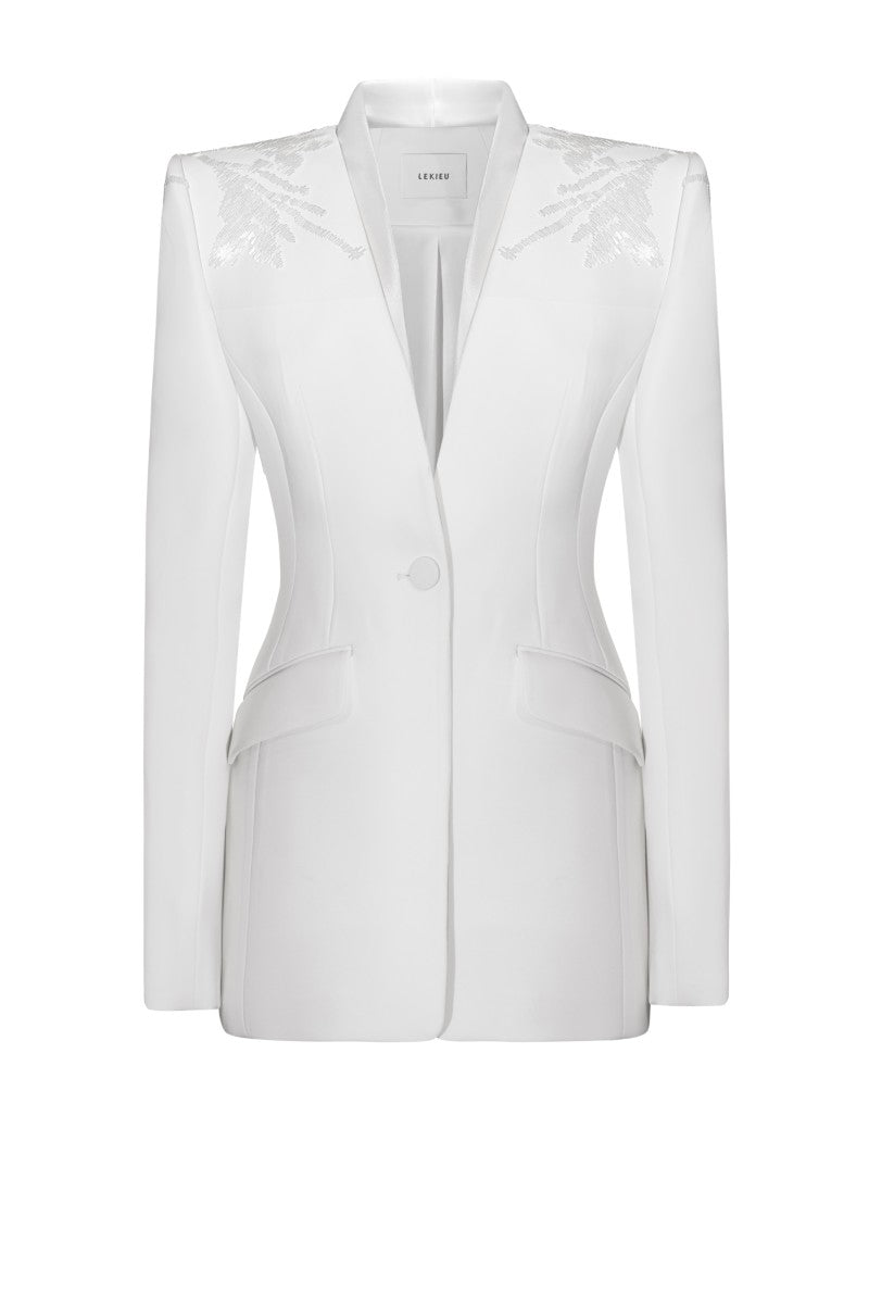 White LEKIEU Venice jacket shown on a hanger with a clean background, highlighting the stylish design and fabric details.