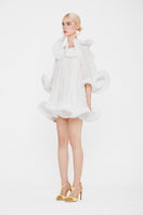White Valenciani Origami Cloud mini dress shown on a hanger, featuring a lightweight, stylish design perfect for casual or party wear.