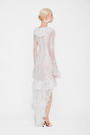 White Seraphina Ruffle High-Low Midi Dress by Valenciani featuring ruffled details and a flowing high-low hem.