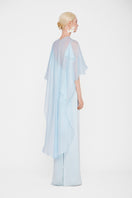 Valenciani The Galatea cape gown in ice blue, a flowing maxi dress with elegant cape details, perfect for formal occasions.