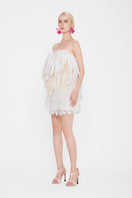 Valenciani Jelly Fish mini dress in white, lightweight fabric with a fitted bodice and flared skirt, displayed on a hanger.