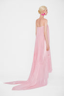 Pastel pink strapless pleated maxi dress by Valenciani, flowing fabric with a fitted bodice and elegant length.