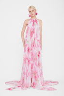 Multicolor Valenciani halter neck pleated maxi dress displayed on a mannequin with flowing fabric and vibrant pattern.