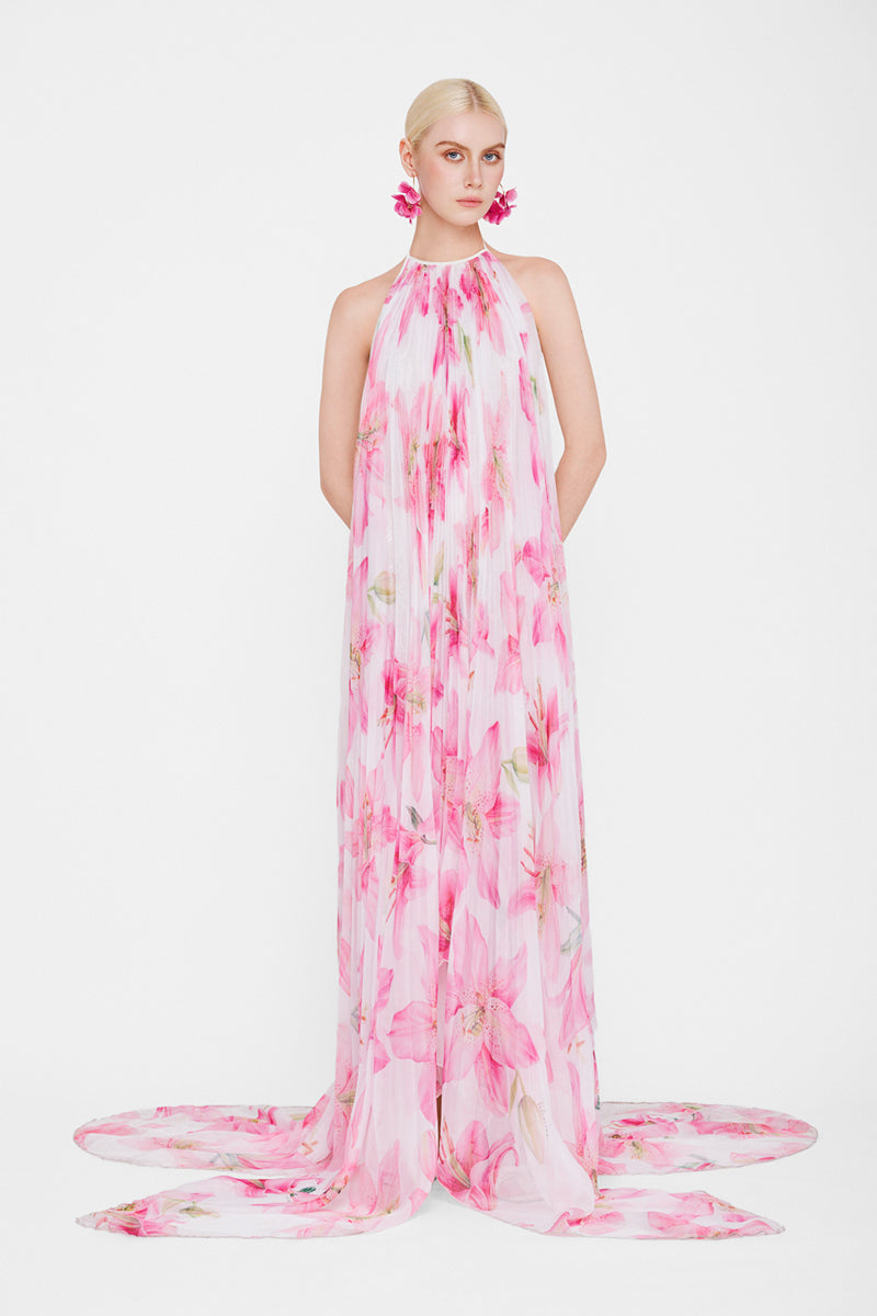Valenciani halter neck pleated maxi dress in multicolor, flowing fabric with a stylish sleeveless design and vibrant pattern.