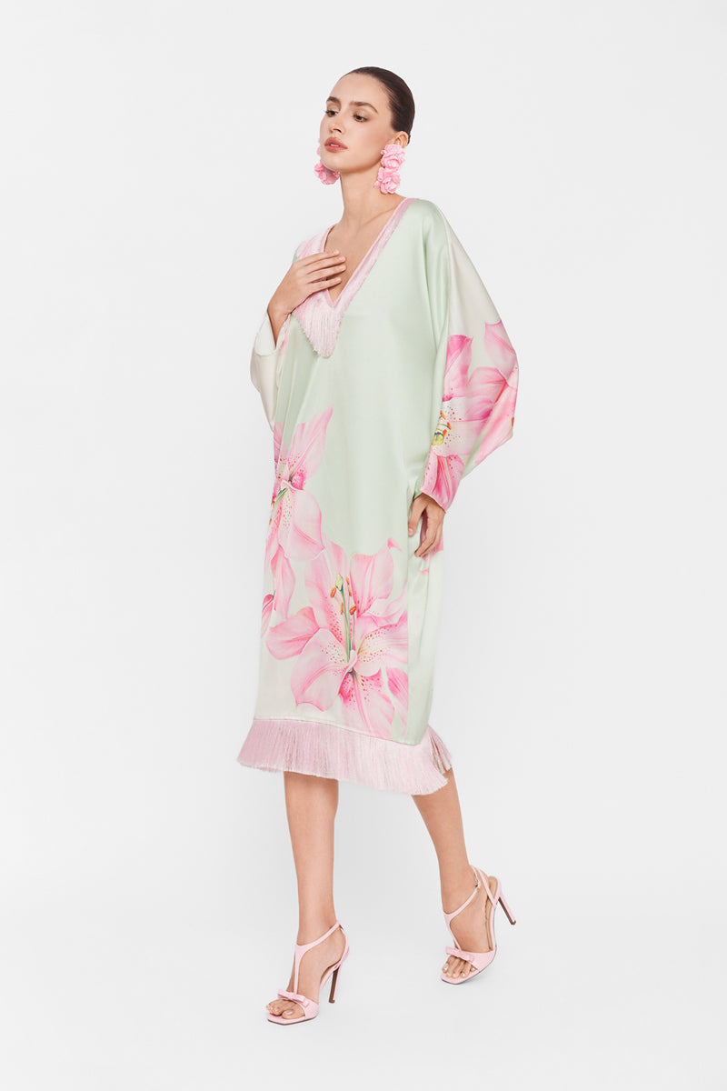 Colorful V-neck midi kaftan dress by Valenciani, featuring a flowing silhouette and vibrant multicolor pattern.