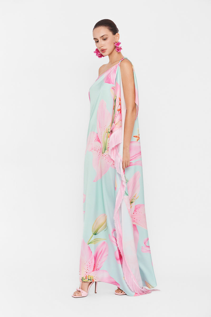 Valenciani multicolor one-shoulder maxi dress displayed on a mannequin with flowing fabric and vibrant pattern.