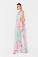 Valenciani multicolor one-shoulder maxi dress displayed on a mannequin with flowing fabric and vibrant pattern.